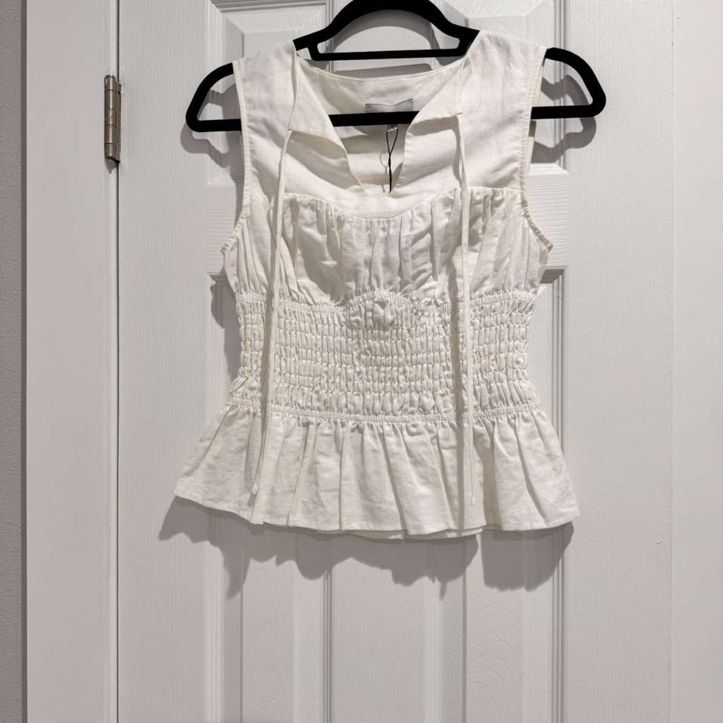 Smocked White Peplum Camisole With Tie Straps
